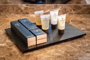 a group of three products sitting on a table at Golden Sands Suites in Dubai