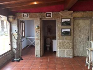 a room with a bathroom with a toilet in it at House - 4 Bedrooms with Pool - 4093 in A Estrada