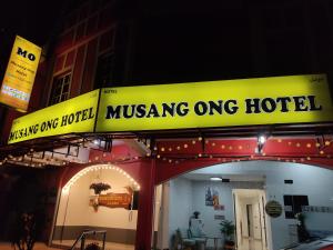 a moving one hotel sign on top of a building at MUSANG ONG HOTEL in Cameron Highlands