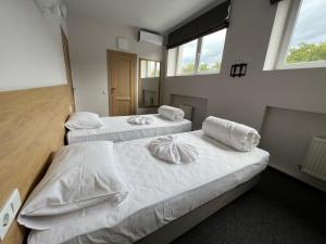 Iris Hotels Resort客房内的一张或多张床位