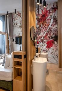 Łóżko lub łóżka w pokoju w obiekcie NEUWIRT - Boutiquehotel & Wirtshaus