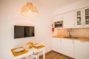 Kuchyň nebo kuchyňský kout v ubytování 188 Apartments - Buganvília - pool and balcony
