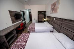 Cama ou camas em um quarto em Hotel Dan Inn Planalto São Paulo
