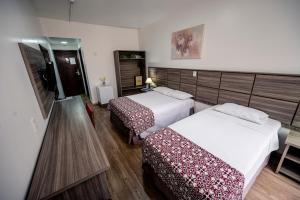 Cama ou camas em um quarto em Hotel Dan Inn Planalto São Paulo