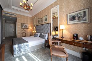 Postel nebo postele na pokoji v ubytování Sapphire City Hotel + 21 fotografií