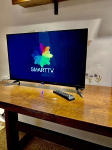 TV a/nebo společenská místnost v ubytování ELENA 39