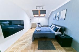 A seating area at Dob Duplex Apartment