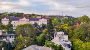 an aerial view of a city with trees and buildings at Warm Family Snug in Budapest