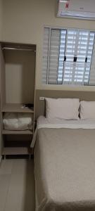 Postel nebo postele na pokoji v ubytování EL SHADDAY HOTEL