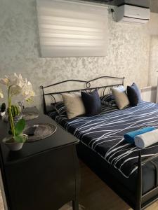 Postel nebo postele na pokoji v ubytování Apartman Stefan Lux