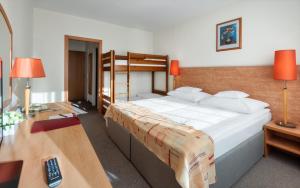 Posteľ alebo postele v izbe v ubytovaní Hunguest Hotel Freya