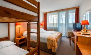 Posteľ alebo postele v izbe v ubytovaní Hunguest Hotel Freya
