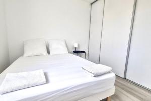 Posteľ alebo postele v izbe v ubytovaní Résidence Anthérieu - Appartements neufs tout confort