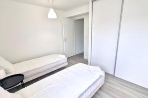 Posteľ alebo postele v izbe v ubytovaní Résidence Anthérieu - Appartements neufs tout confort