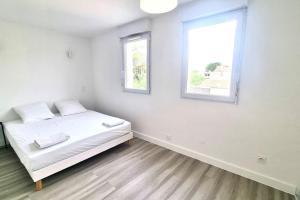 Posteľ alebo postele v izbe v ubytovaní Résidence Anthérieu - Appartements neufs tout confort