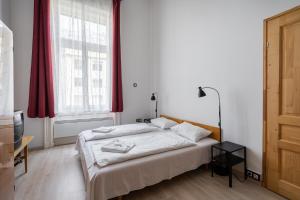 Posteľ alebo postele v izbe v ubytovaní Retro Rebel Mode Apartment