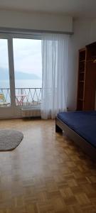 Katil atau katil-katil dalam bilik di La plus belle vue du lac Léman