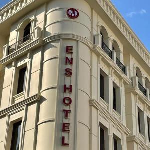 a hotel sign on the side of a building at Ens Hotel in Istanbul