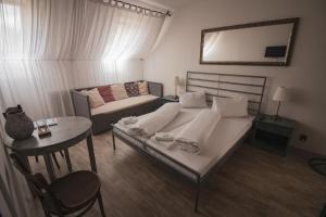 Postel nebo postele na pokoji v ubytování Penzion U Švarců