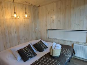 Cama o camas de una habitación en OUTSCAPE l Refugios Puerto Fuy, Huilo Huilo