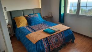 Postel nebo postele na pokoji v ubytování Chambre vue sur mer entre Grande Anse et Manapany