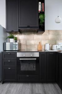 Η κουζίνα ή μικρή κουζίνα στο Beautiful first floor apartment