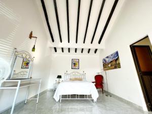 Postel nebo postele na pokoji v ubytování Hacienda La Pola