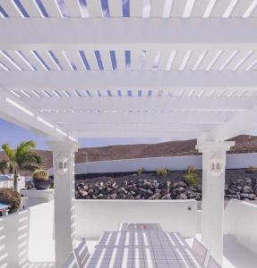 Fotografia z galérie ubytovania Villa Tiguaro Piscina Climat Jacuzzy AC Villa 9 12 v destinácii Corralejo