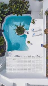Bazén v ubytovaní Villa Tiguaro Piscina Climat Jacuzzy AC Villa 9 12 alebo v jeho blízkosti