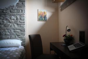 Postel nebo postele na pokoji v ubytování B&B Le Streghe