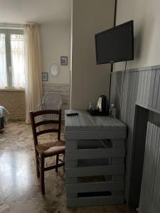 TV a/nebo společenská místnost v ubytování B&B Dell'Annunziata