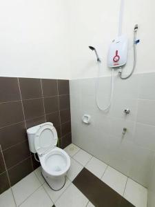 a bathroom with a toilet and a shower at 2-Storey Near Aeon Bukit Indah/ Legoland (6 paxs) in Johor Bahru