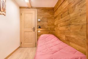 Letto o letti in una camera di Baita Dani