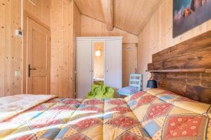 Letto o letti in una camera di Baita Dani
