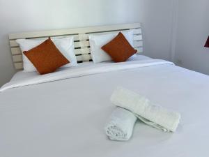 Letto o letti in una camera di The 4 Blocks at Kata noi