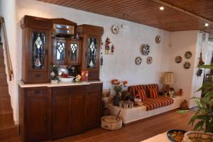 a living room with a couch and a chair at Hotel Tsagarakis Beach in Amoudara Herakliou