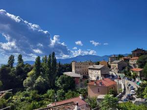 a view of a city with cars driving down a street at Apartment Audrey - free parking by Irundo in Rijeka