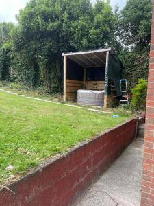 a house with a tent in a yard at Belfast private room, en-suite & own access in Belfast