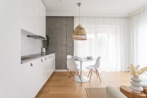 Kuchyňa alebo kuchynka v ubytovaní S35 Apartments Gdynia Orłowo
