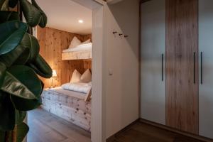 Łóżko lub łóżka w pokoju w obiekcie Penthouse „Das Besenhaus“
