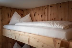 Łóżko lub łóżka w pokoju w obiekcie Penthouse „Das Besenhaus“