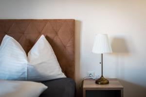 Łóżko lub łóżka w pokoju w obiekcie Penthouse „Das Besenhaus“