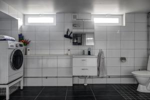 Koupelna v ubytování Flores + 1 fotografie