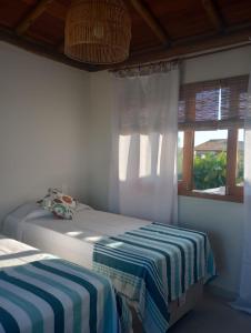 Ένα ή περισσότερα κρεβάτια σε δωμάτιο στο Casa D´Alicia