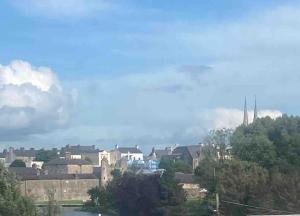 a view of a city with buildings and trees at Erne Getaway No.6 Brand new 1 bed apartment in Enniskillen