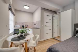 Η κουζίνα ή μικρή κουζίνα στο Central Platinum Apartments 18