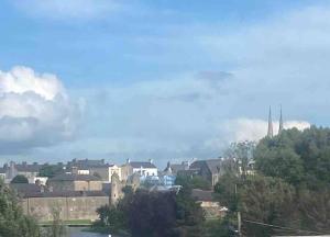 a view of a city with buildings and trees at Erne Getaway No.8 Brand new 1 bed apartment in Enniskillen