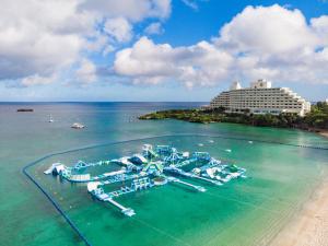 an aerial view of a resort and the water park at ANA InterContinental Manza Beach Resort by IHG in Onna