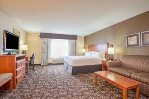 a hotel room with a bed and a television at Holiday Inn Express Casper I-25, an IHG Hotel in Casper