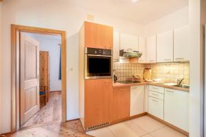 Kuchyň nebo kuchyňský kout v ubytování Pausahof - Apartment Abendsonne